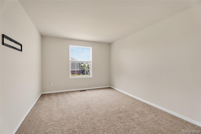 6119 Amber Ln, Grand Blanc, MI 48439 - carpeted spare room with baseboards