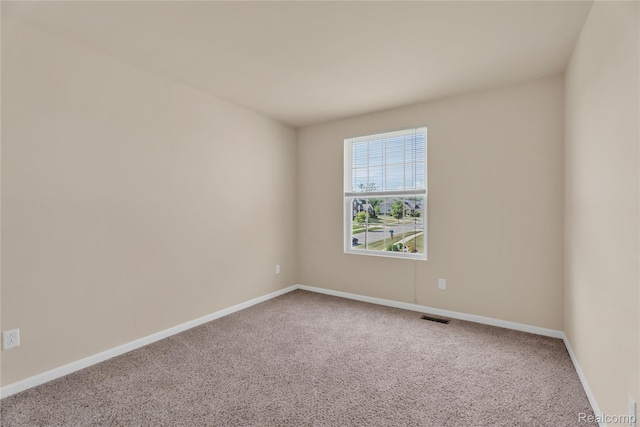 6119 Amber Ln, Grand Blanc, MI 48439 - carpeted empty room featuring baseboards