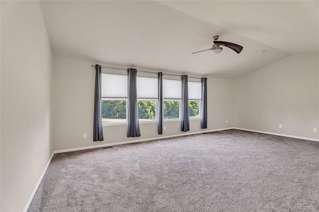 6119 Amber Ln, Grand Blanc, MI 48439 - carpeted spare room with a ceiling fan and lofted ceiling