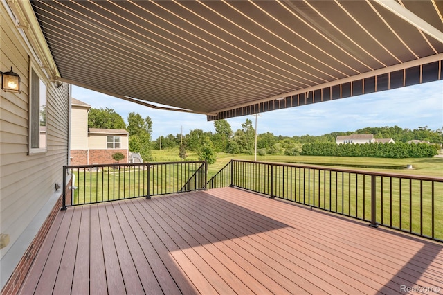 6119 Amber Ln, Grand Blanc, MI 48439 - deck with a yard and view of wooded area