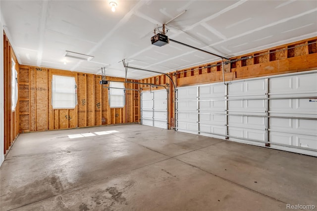 6119 Amber Ln, Grand Blanc, MI 48439 - garage featuring a garage door opener