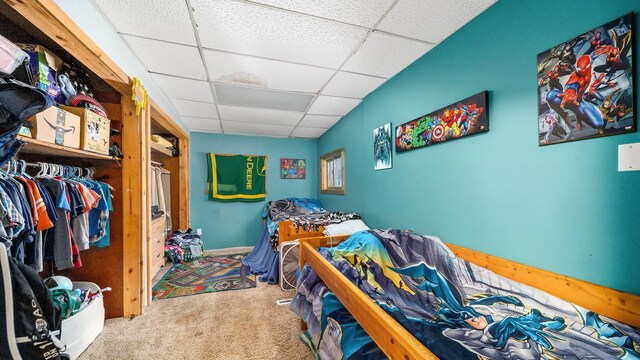 405 W 5th St, Evart, MI 49631 - bedroom featuring a drop ceiling and carpet