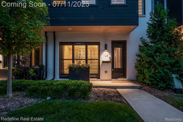 722 E Parent Ave, Royal Oak, MI 48067 - doorway to property with brick siding and covered porch