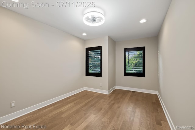 722 E Parent Ave, Royal Oak, MI 48067 - empty room with wood finished floors and recessed lighting