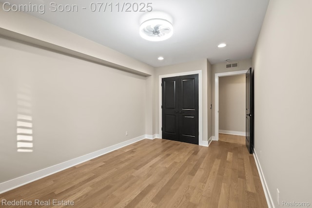 722 E Parent Ave, Royal Oak, MI 48067 - unfurnished bedroom featuring light wood-type flooring and recessed lighting