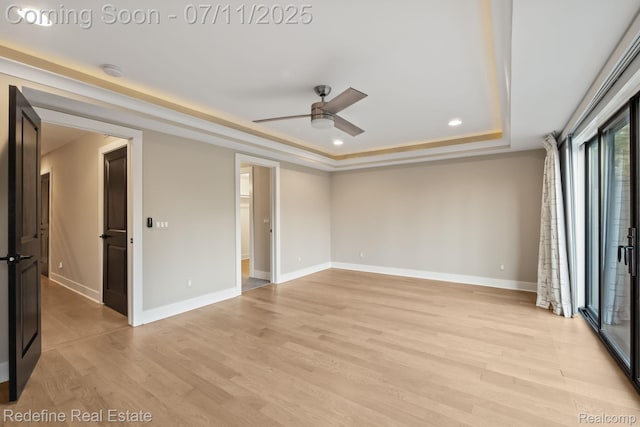 722 E Parent Ave, Royal Oak, MI 48067 - unfurnished room featuring a tray ceiling, a ceiling fan, light wood finished floors, a smoke detector, and recessed lighting