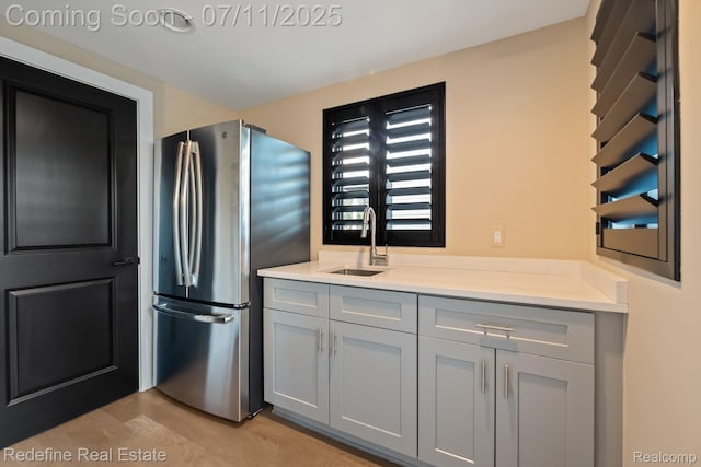 722 E Parent Ave, Royal Oak, MI 48067 - kitchen with freestanding refrigerator, light countertops, and gray cabinets