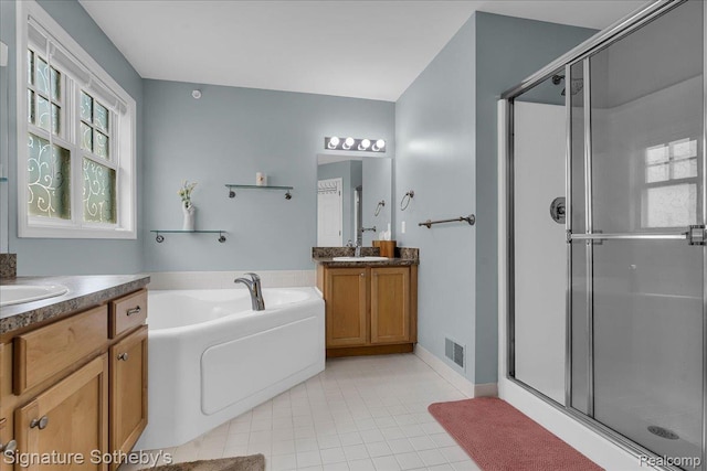 182 Amys Walk, Auburn Hills, MI 48326 - full bath with a stall shower, two vanities, tile patterned floors, and a garden tub