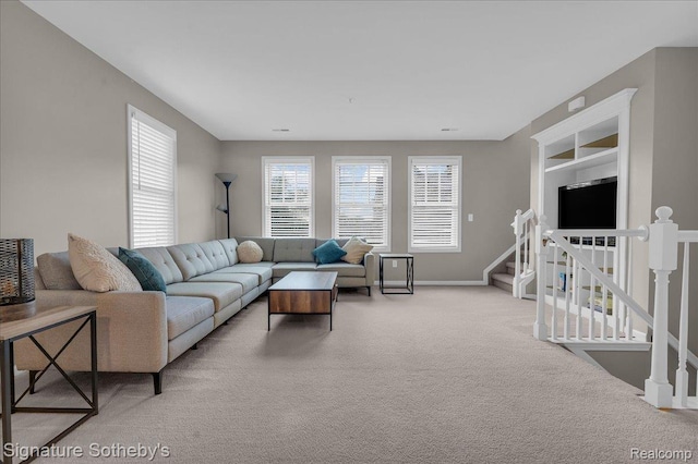 182 Amys Walk, Auburn Hills, MI 48326 - living room with light carpet and stairway