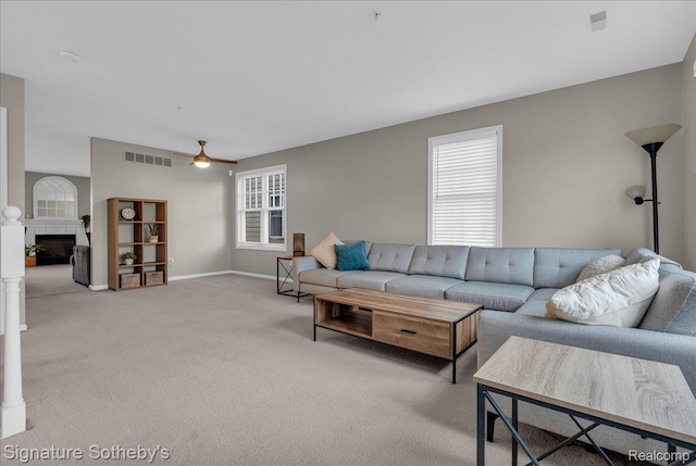182 Amys Walk, Auburn Hills, MI 48326 - carpeted living area featuring a fireplace and ceiling fan