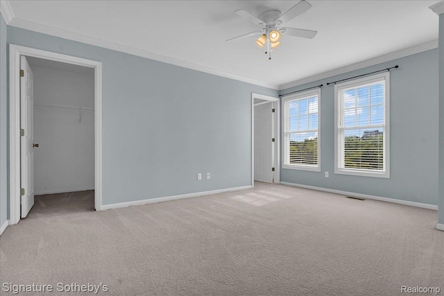 182 Amys Walk, Auburn Hills, MI 48326 - unfurnished bedroom featuring ornamental molding, light carpet, a ceiling fan, and a spacious closet