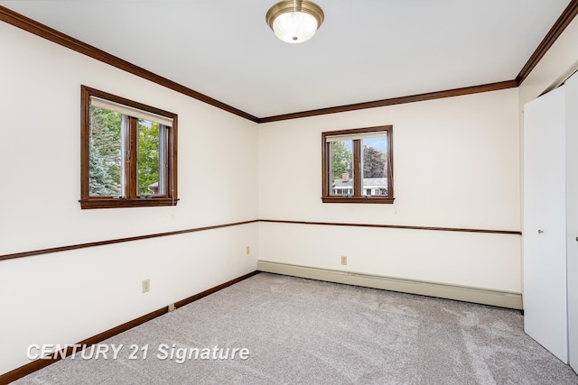 2936 Reppuhn Dr, Saginaw, MI 48603 - carpeted empty room with a baseboard heating unit, plenty of natural light, and crown molding