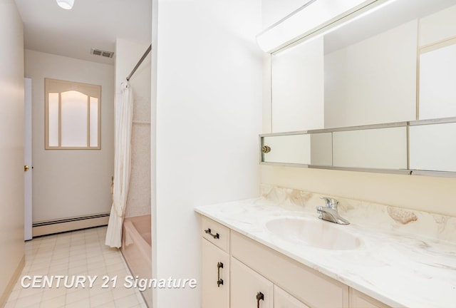 2936 Reppuhn Dr, Saginaw, MI 48603 - full bathroom featuring baseboard heating, vanity, shower / bath combination with curtain, and tile patterned flooring