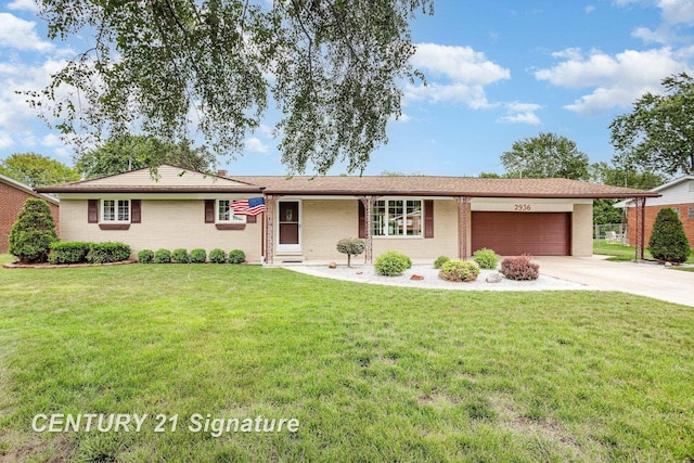 2936 Reppuhn Dr, Saginaw, MI 48603 - single story home with a garage, driveway, and a front lawn