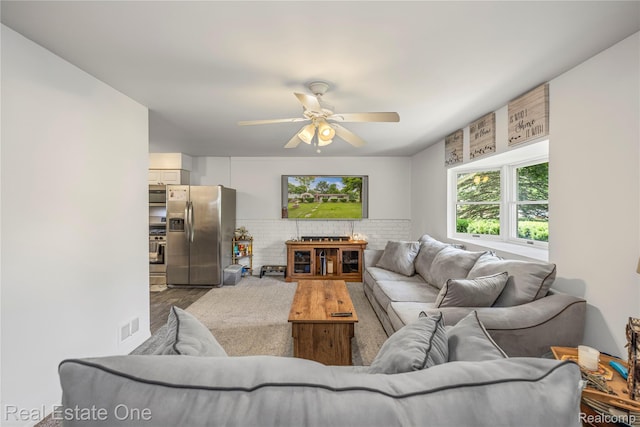 7241 Richardson Rd, West Bloomfield, MI 48323 - living area with a ceiling fan and wood finished floors