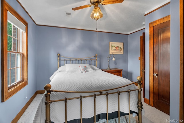 648 S Highland St, Dearborn, MI 48124 - bedroom with multiple windows, carpet floors, crown molding, and ceiling fan