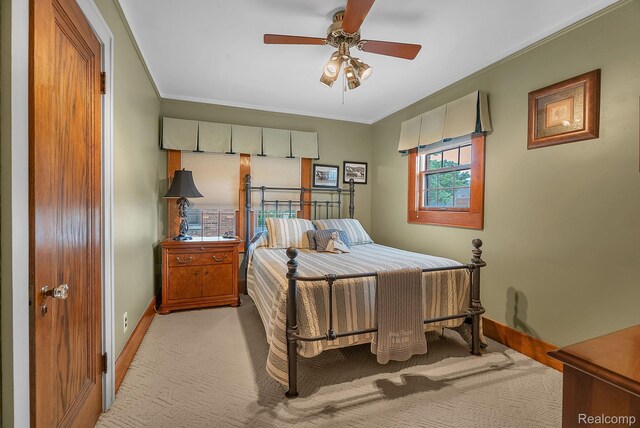 648 S Highland St, Dearborn, MI 48124 - bedroom with light colored carpet and crown molding