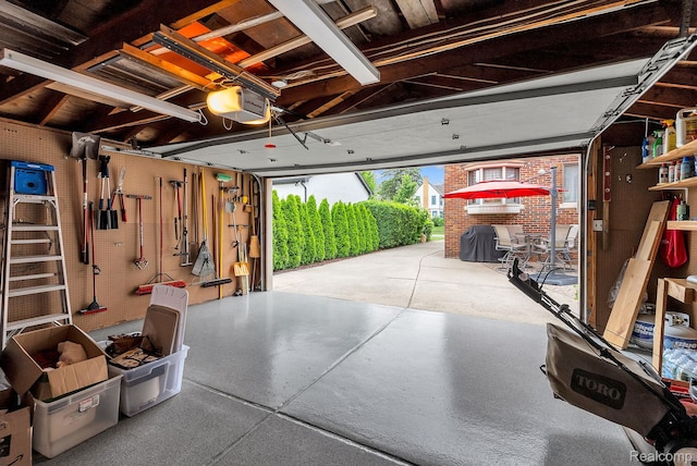 648 S Highland St, Dearborn, MI 48124 - garage featuring a garage door opener