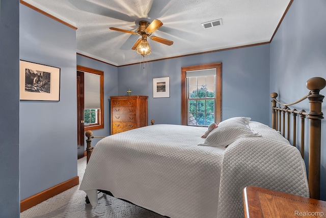 648 S Highland St, Dearborn, MI 48124 - carpeted bedroom with ornamental molding and a ceiling fan