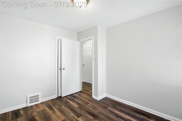 65 Martin Luther King Jr Blvd N, Pontiac, MI 48342 - unfurnished room with dark wood-type flooring and baseboards