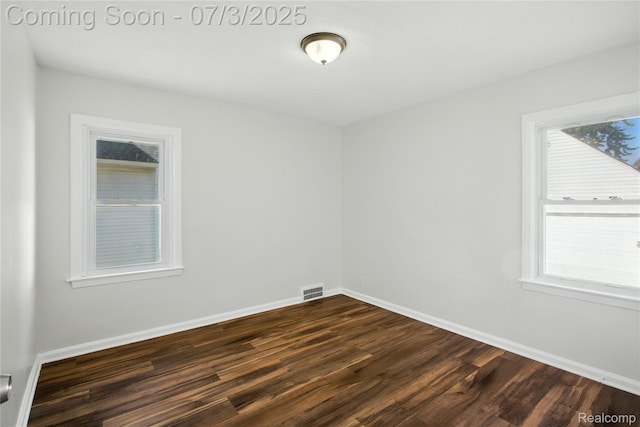 65 Martin Luther King Jr Blvd N, Pontiac, MI 48342 - empty room featuring dark wood-style flooring and baseboards