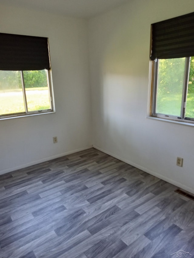 3308 Douglass St, Saginaw, MI 48601 - empty room with wood finished floors and baseboards