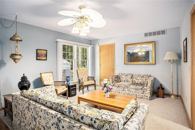 15891 Lakeview Dr, Buchanan, MI 49107 - carpeted living area with ceiling fan and baseboards