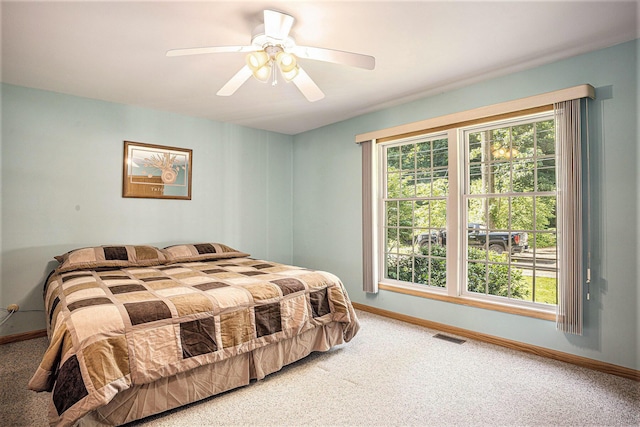 15891 Lakeview Dr, Buchanan, MI 49107 - carpeted bedroom with baseboards and a ceiling fan
