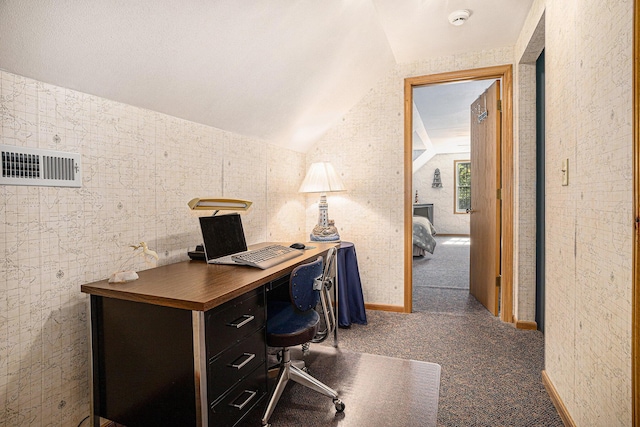 15891 Lakeview Dr, Buchanan, MI 49107 - carpeted home office featuring vaulted ceiling and baseboards