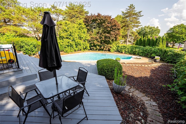 42331 Beacontree Ct, Northville, MI 48168 - view of pool featuring a wooden deck and outdoor dining area