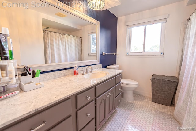 42331 Beacontree Ct, Northville, MI 48168 - full bathroom with vanity, tile patterned floors, and a shower with curtain