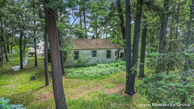 5752 E 52nd St, Newaygo, MI 49337 - view of front of home with stucco siding