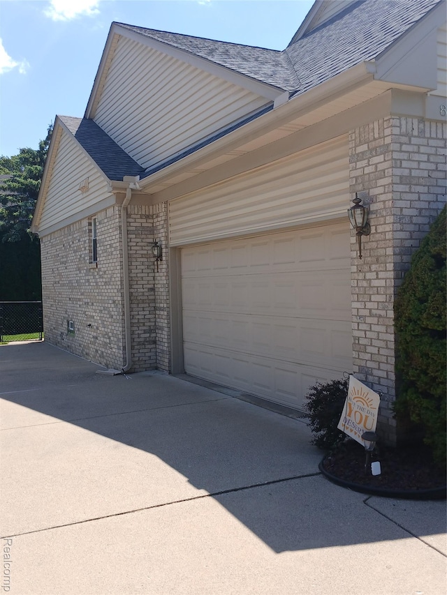 8086 Pickering Pl, Westland, MI 48185 - garage featuring driveway