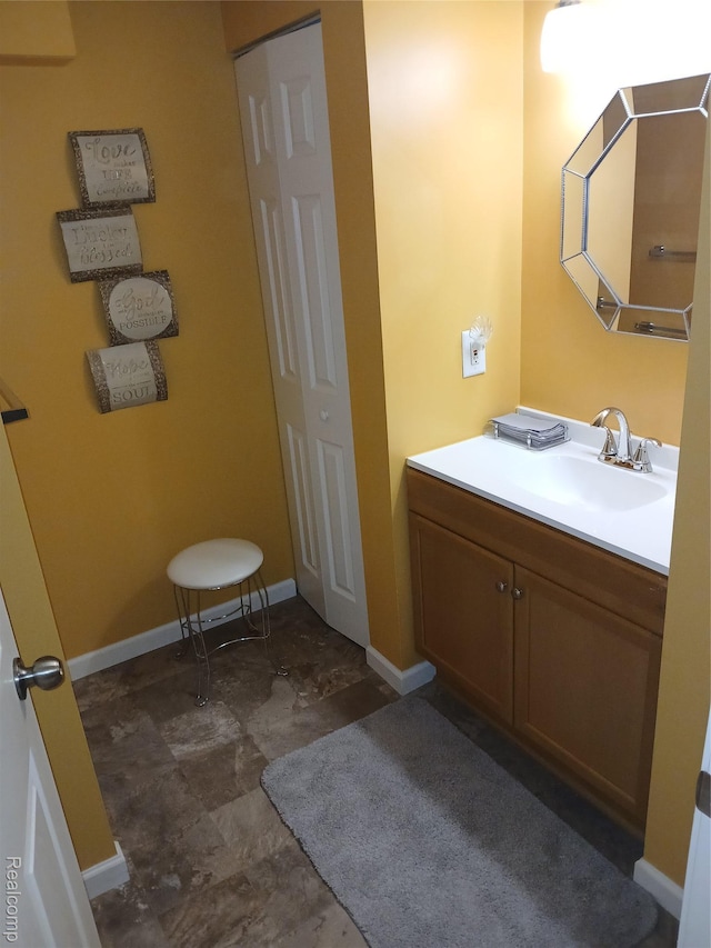8086 Pickering Pl, Westland, MI 48185 - bathroom with vanity and baseboards