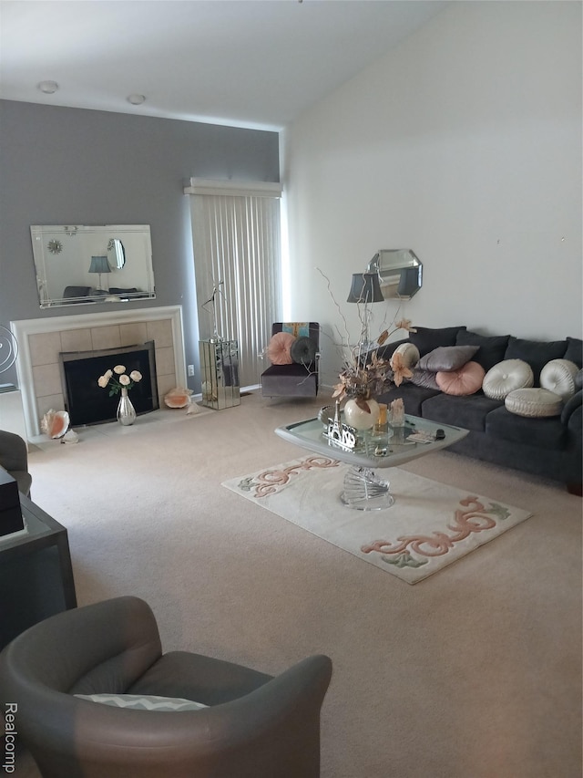 8086 Pickering Pl, Westland, MI 48185 - living room with carpet flooring, a fireplace, and vaulted ceiling