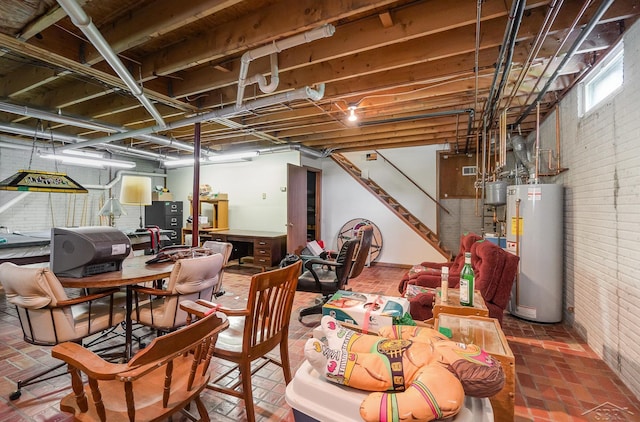 5772 Greensboro Way, Gladwin, MI 48624 - below grade area with gas water heater, brick wall, stairway, and brick floors