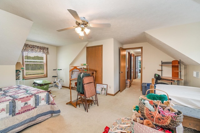 5772 Greensboro Way, Gladwin, MI 48624 - bedroom with light colored carpet, a ceiling fan, and a textured ceiling