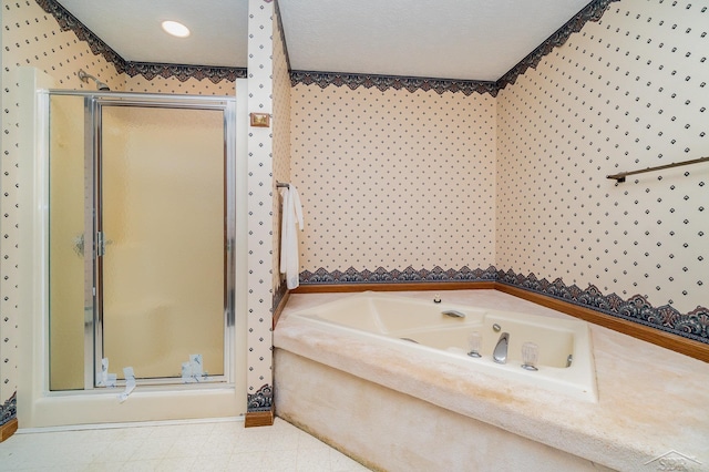 5772 Greensboro Way, Gladwin, MI 48624 - bathroom with a stall shower, a bath, wallpapered walls, and tile patterned floors