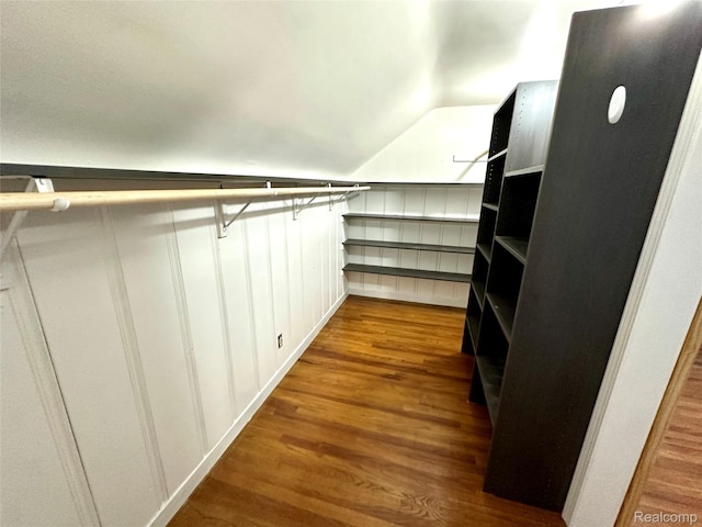 20979 Audette St, Dearborn, MI 48124 - walk in closet with lofted ceiling and dark wood-type flooring