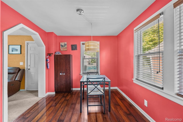 26752 Blackmar Ave, Warren, MI 48091 - dining space with dark wood-type flooring and arched walkways