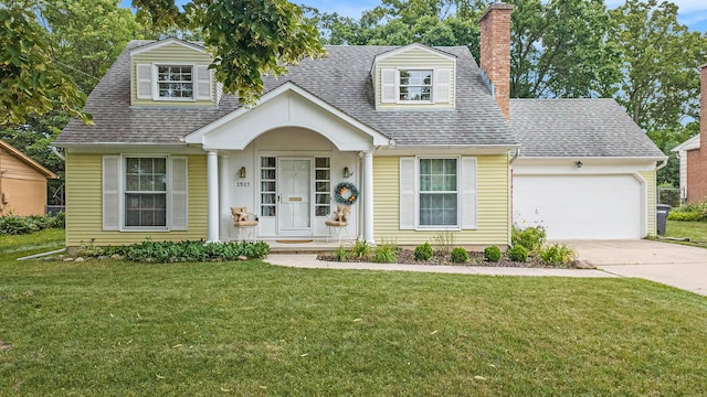 1507 Dicken Dr, Ann Arbor, MI 48103 - view of front of home with a garage, a chimney, driveway, roof with shingles, and a front lawn