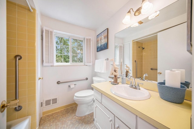 1507 Dicken Dr, Ann Arbor, MI 48103 - bathroom with vanity, tile patterned flooring, and washtub / shower combination