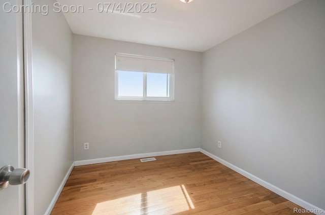 37718 Douglas Ct, Sterling Heights, MI 48310 - unfurnished room with light wood-style floors and baseboards