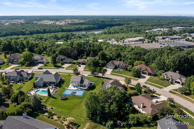 5322 S Silverstone Dr NE, Comstock Park, MI 49321 - aerial overview of property's location with nearby suburban area and a pool area