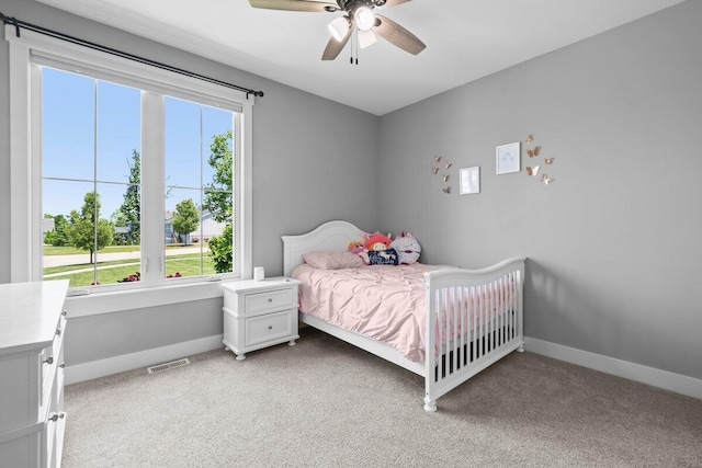 1560 Marksbury Ct, Byron Center, MI 49315 - bedroom with light colored carpet and ceiling fan