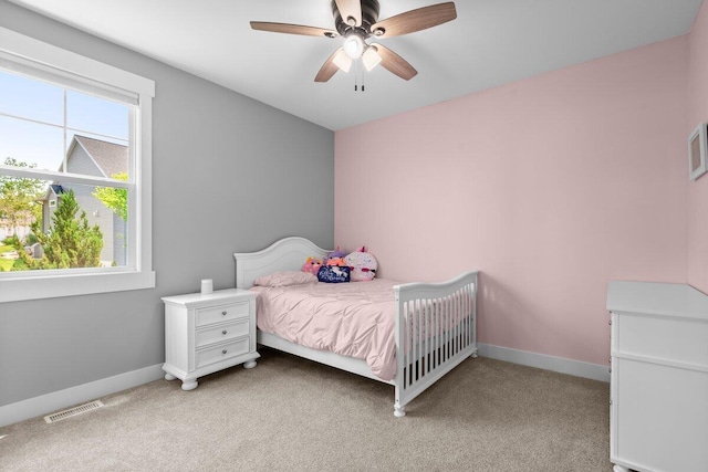 1560 Marksbury Ct, Byron Center, MI 49315 - bedroom with light colored carpet and a ceiling fan