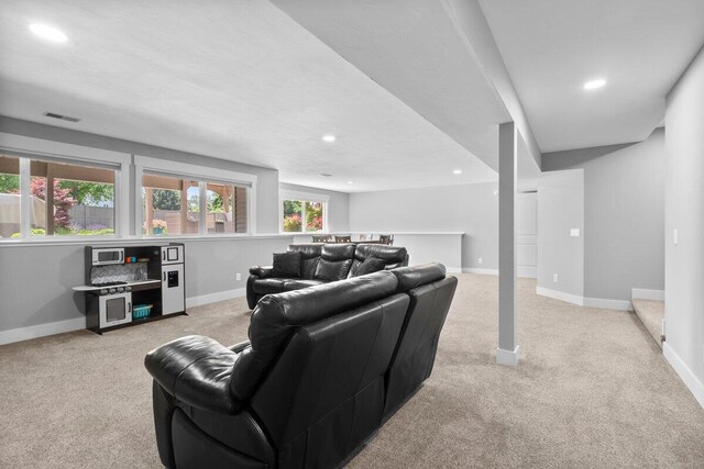 1560 Marksbury Ct, Byron Center, MI 49315 - living area with light colored carpet and recessed lighting