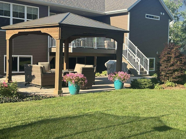 1560 Marksbury Ct, Byron Center, MI 49315 - back of house with a lawn, outdoor lounge area, a gazebo, and a patio area