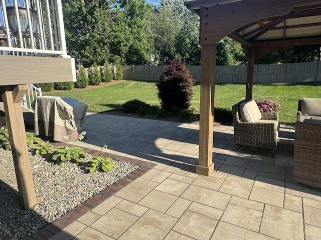 1560 Marksbury Ct, Byron Center, MI 49315 - fenced backyard featuring a patio area and a gazebo