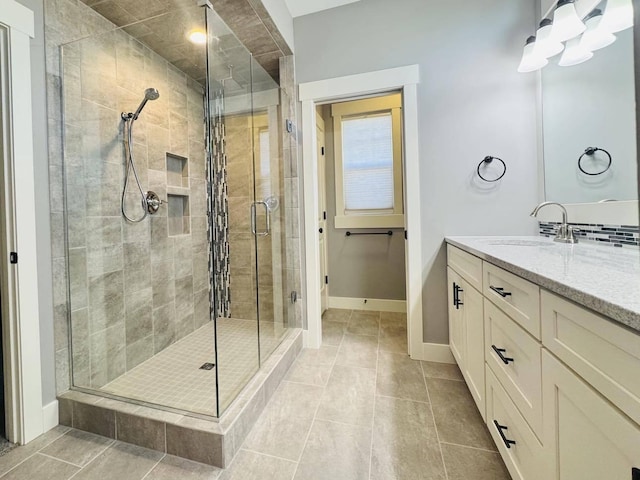 1560 Marksbury Ct, Byron Center, MI 49315 - bathroom featuring vanity, a stall shower, and tile patterned floors
